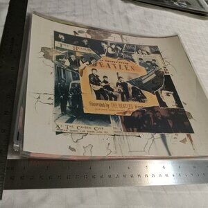 No1 : Ten laminated in plastic posters featuring the Beatles